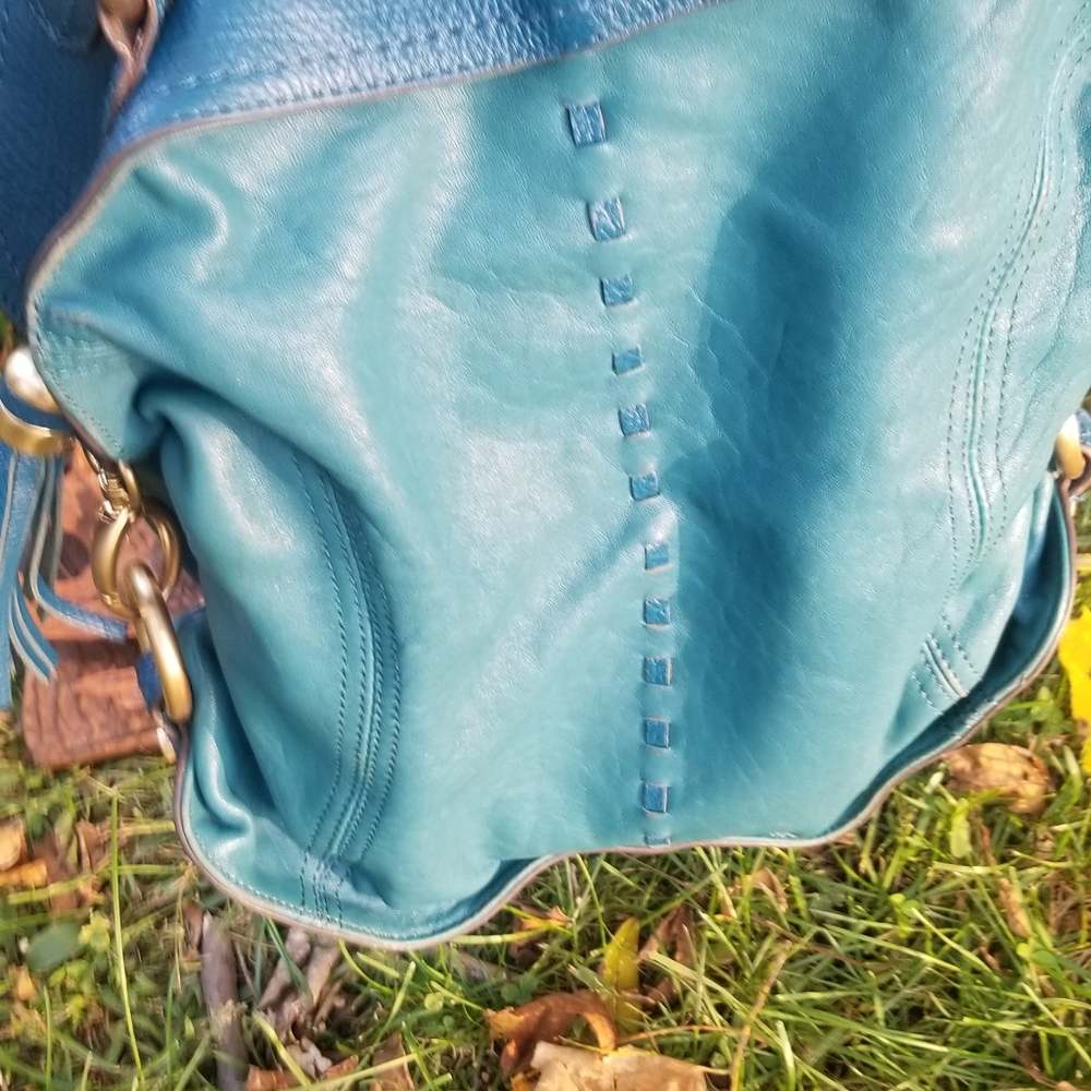 Turquoise leather handbag